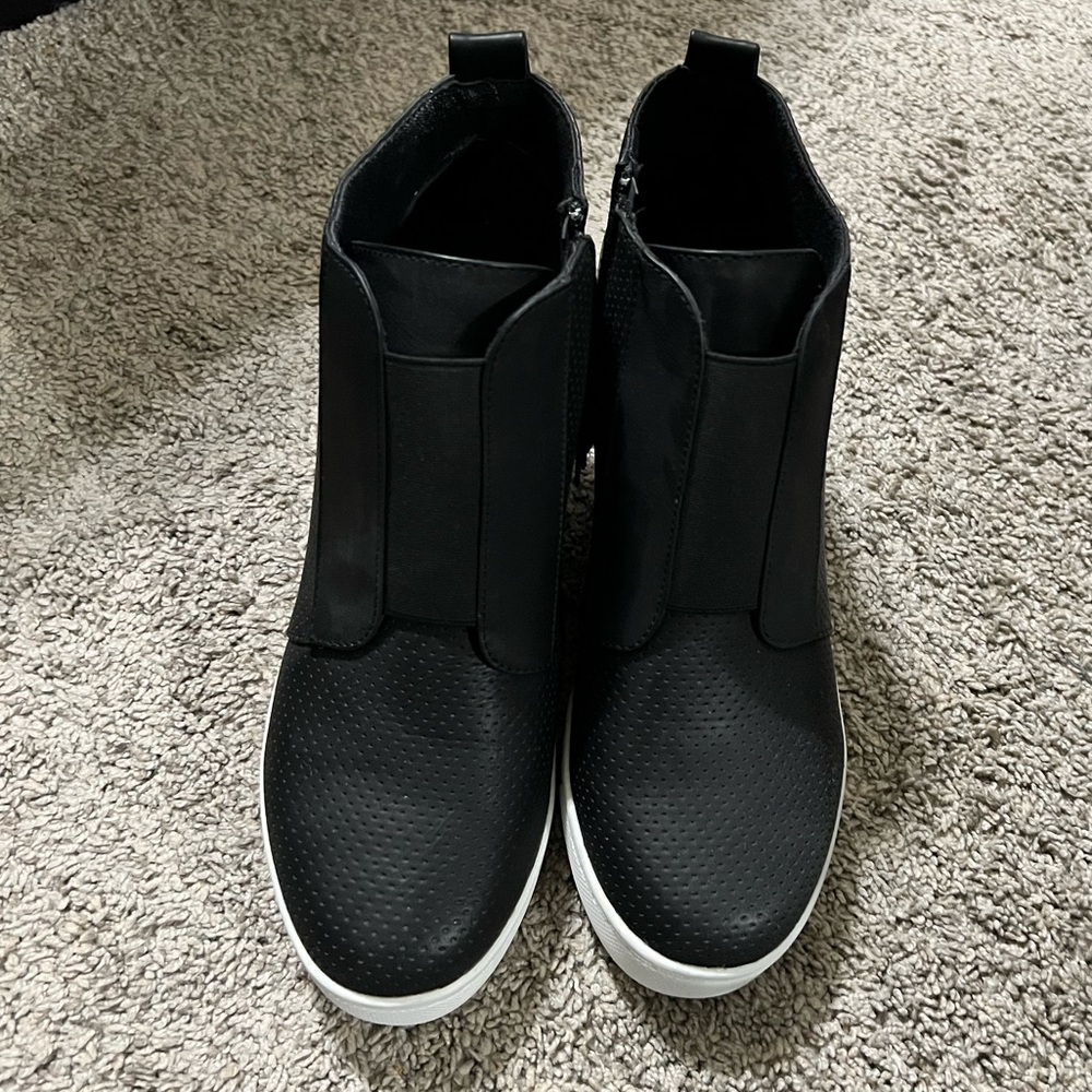 Black high top sneakers